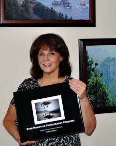 Susan Mueller with her Wildlife Book