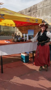Mountain Meadows Mead - Peg Fulder pours samples of organic honey wine at the Fall Festival across from the winery in westwood
