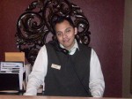 Salvador Garnica at the front desk