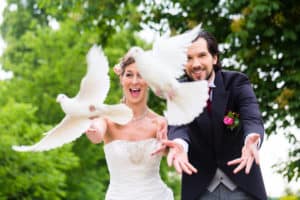 Bride and groom with doves